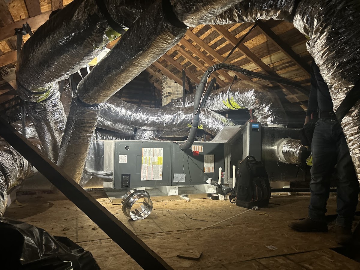 HVAC air handler installation in attic by Adam and Sons